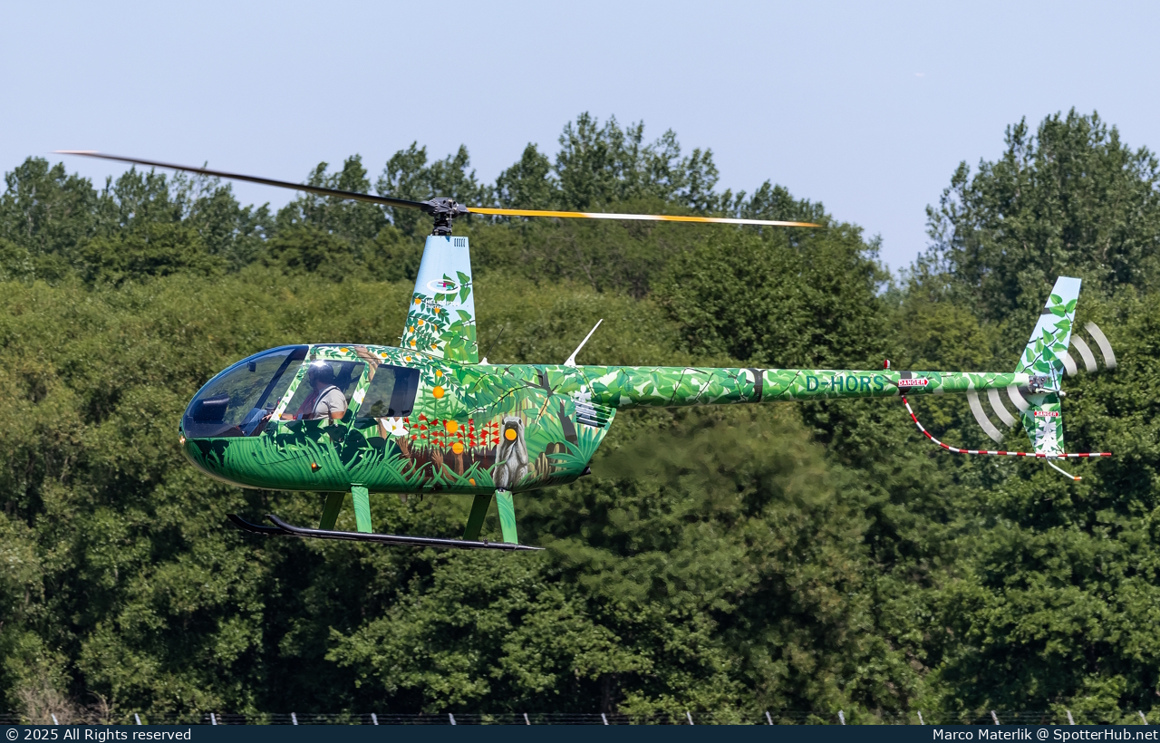 Photo of D-HORS - Robinson R44 Raven II operated by The Helicopter Centre