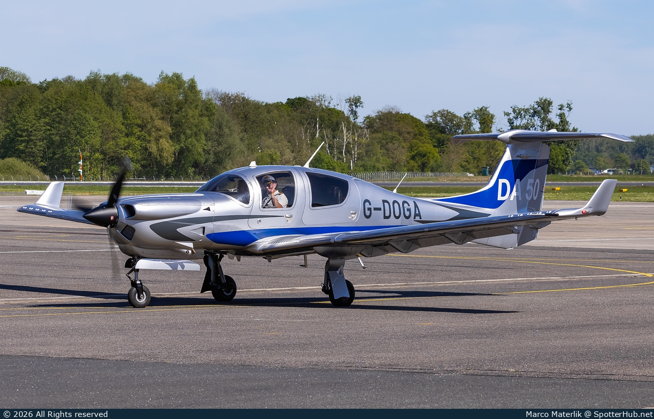 Photo of G-DOGA - Diamond DA50 RG operated by Private