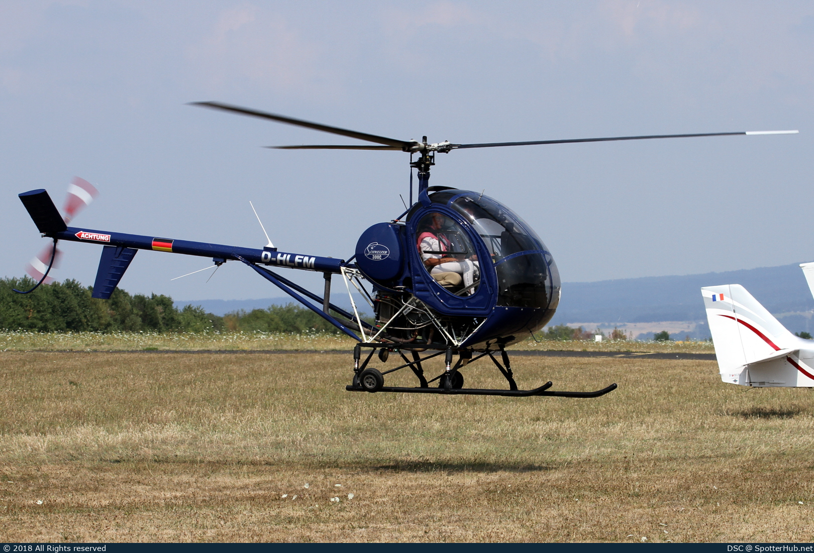 Photo of D-HLFM - Schweizer 300C operated by Private