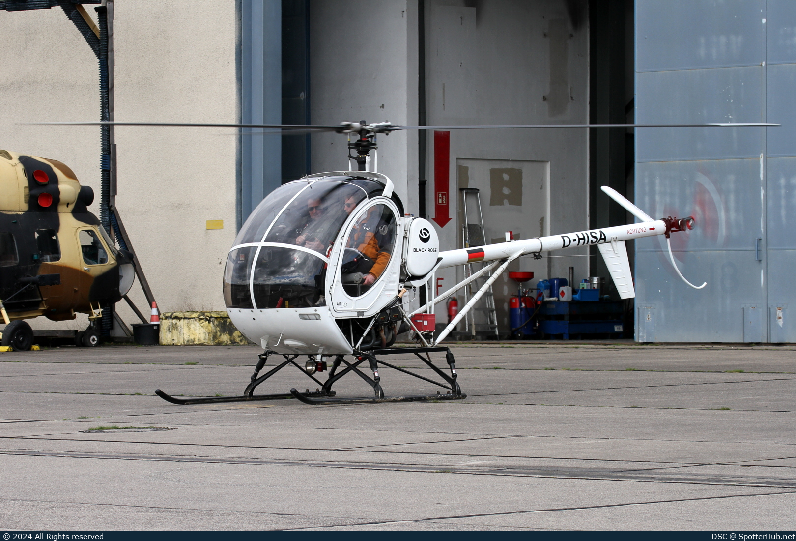 Photo of D-HISA - Schweizer 300C operated by Private