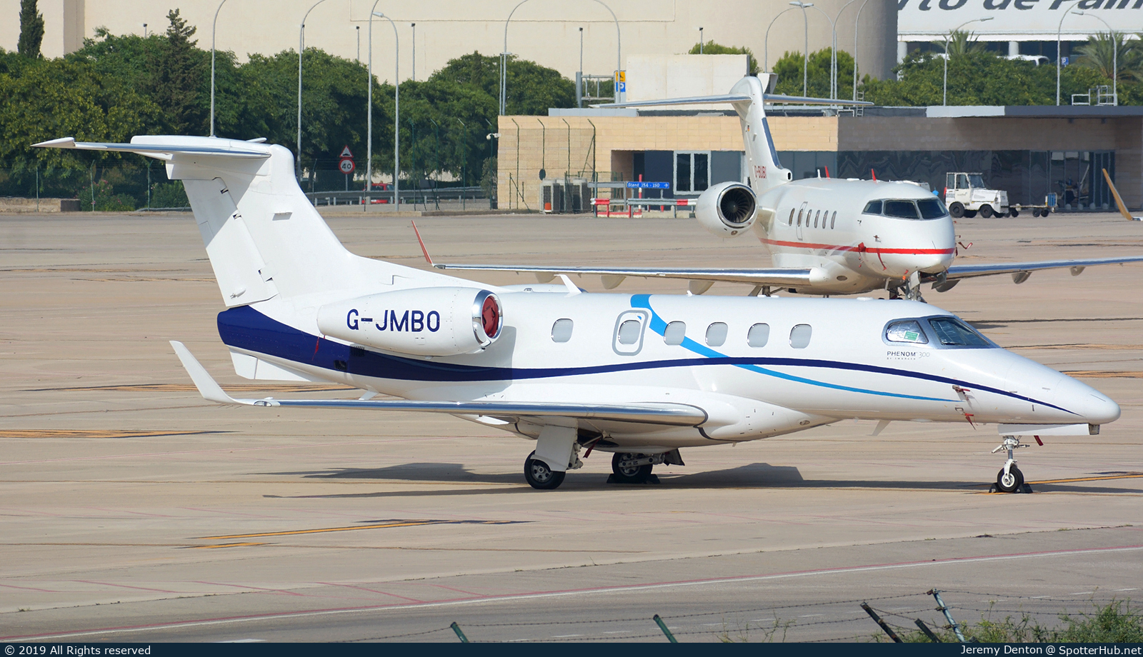 Photo of G-JMBO - Embraer Phenom 300 operated by Catreus
