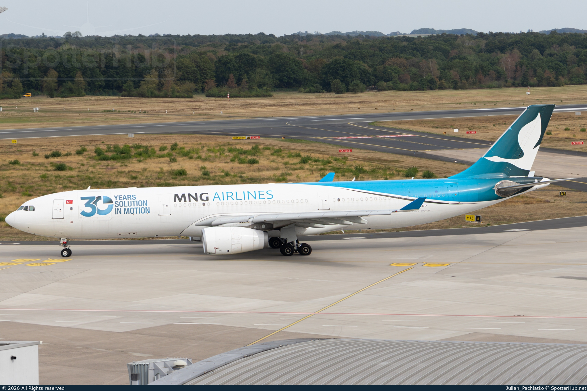 Photo of TC-MCP - Airbus A330-343(P2F) operated by MNG Airlines
