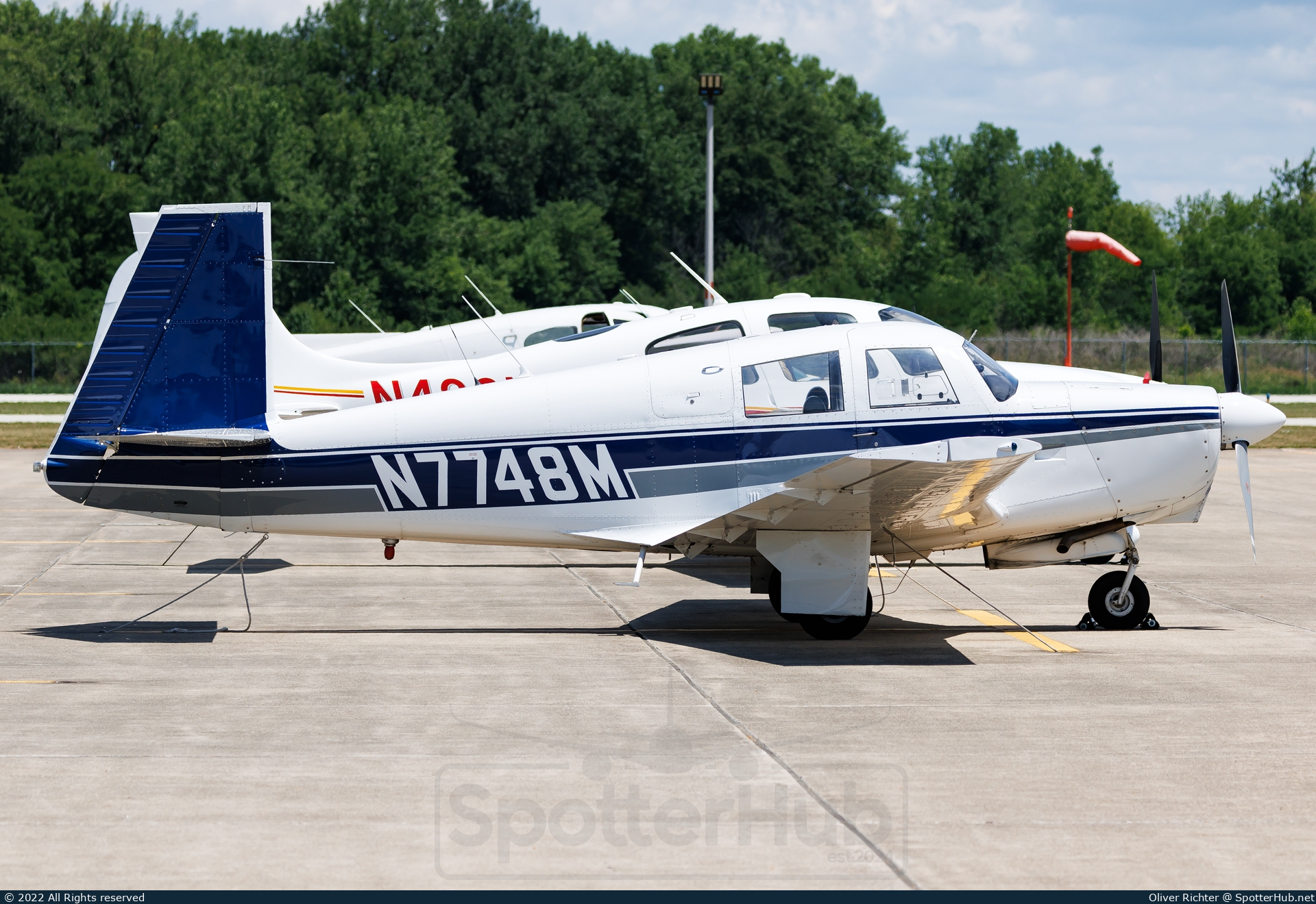 Photo of N7748M - Mooney M20C Mark 21 operated by Private