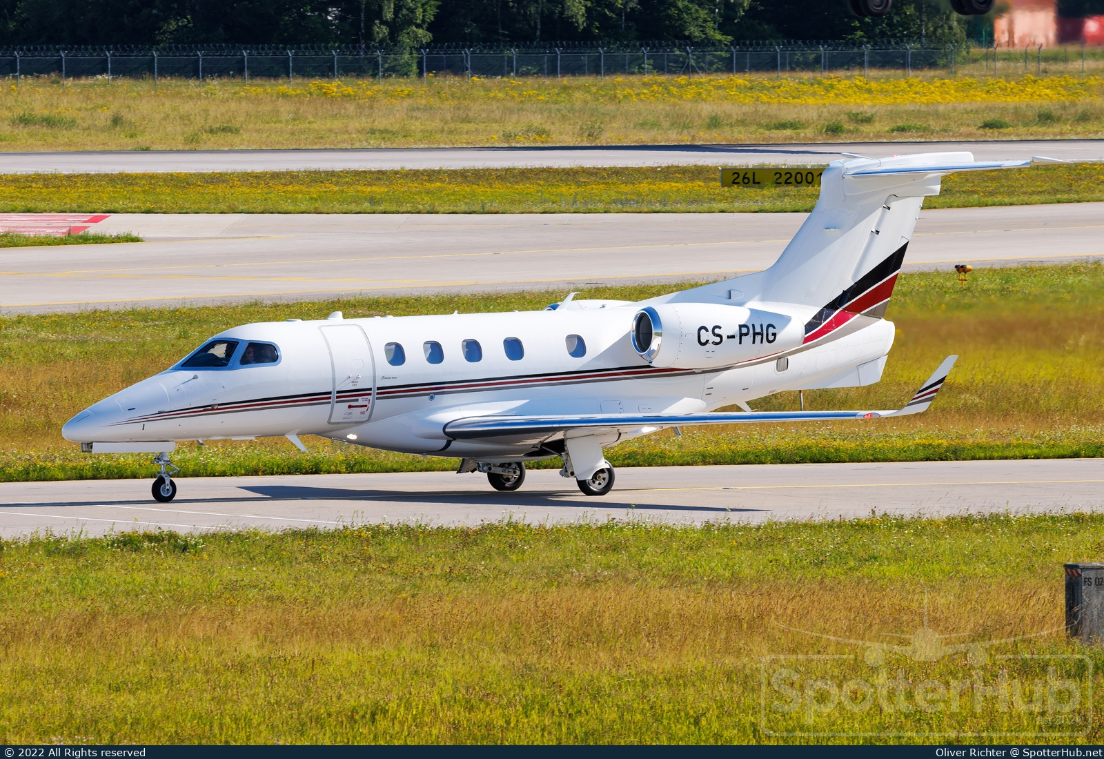 Photo of CS-PHG - Embraer Phenom 300 operated by NetJets Europe