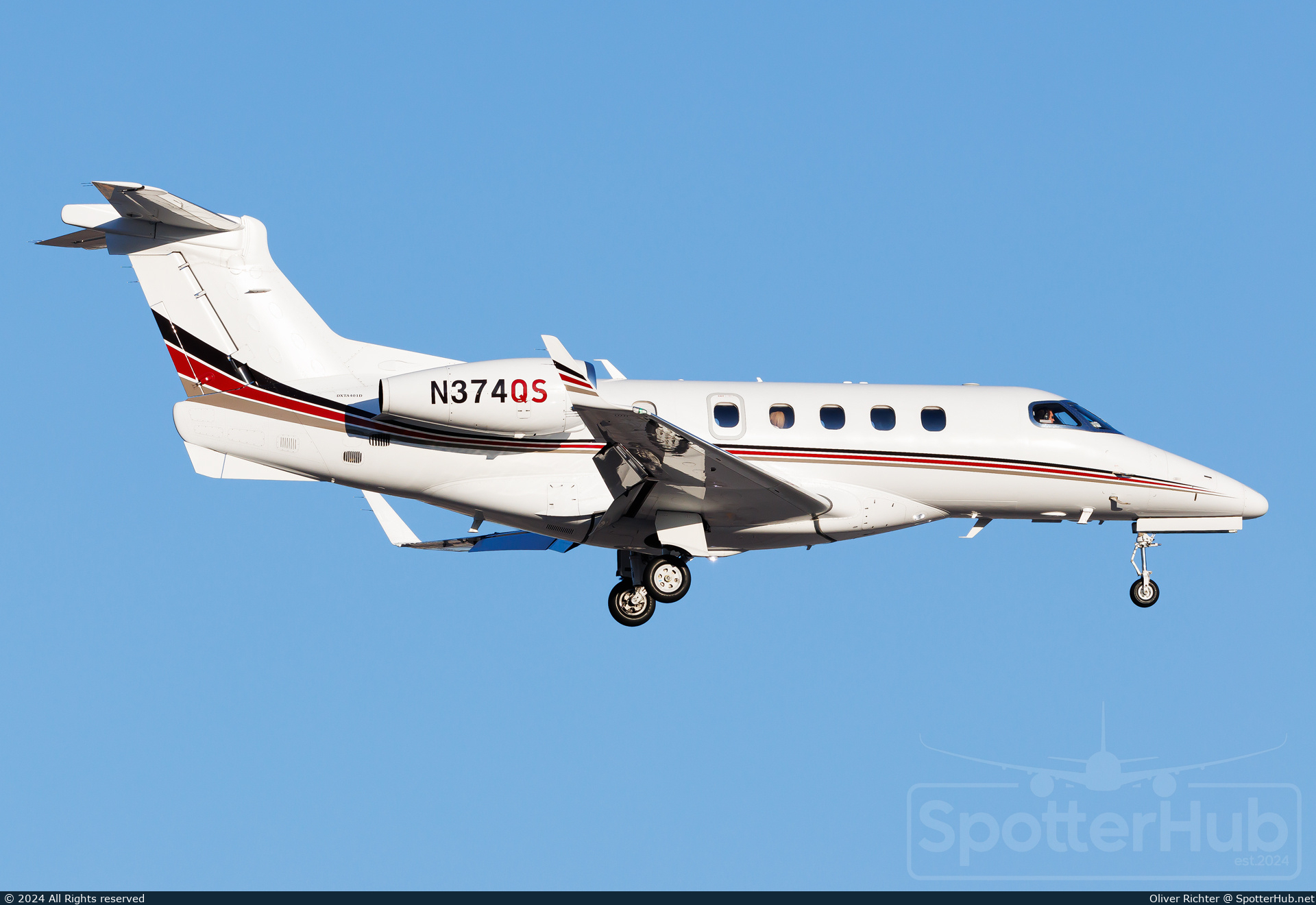 Photo of N374QS - Embraer Phenom 300 operated by NetJets