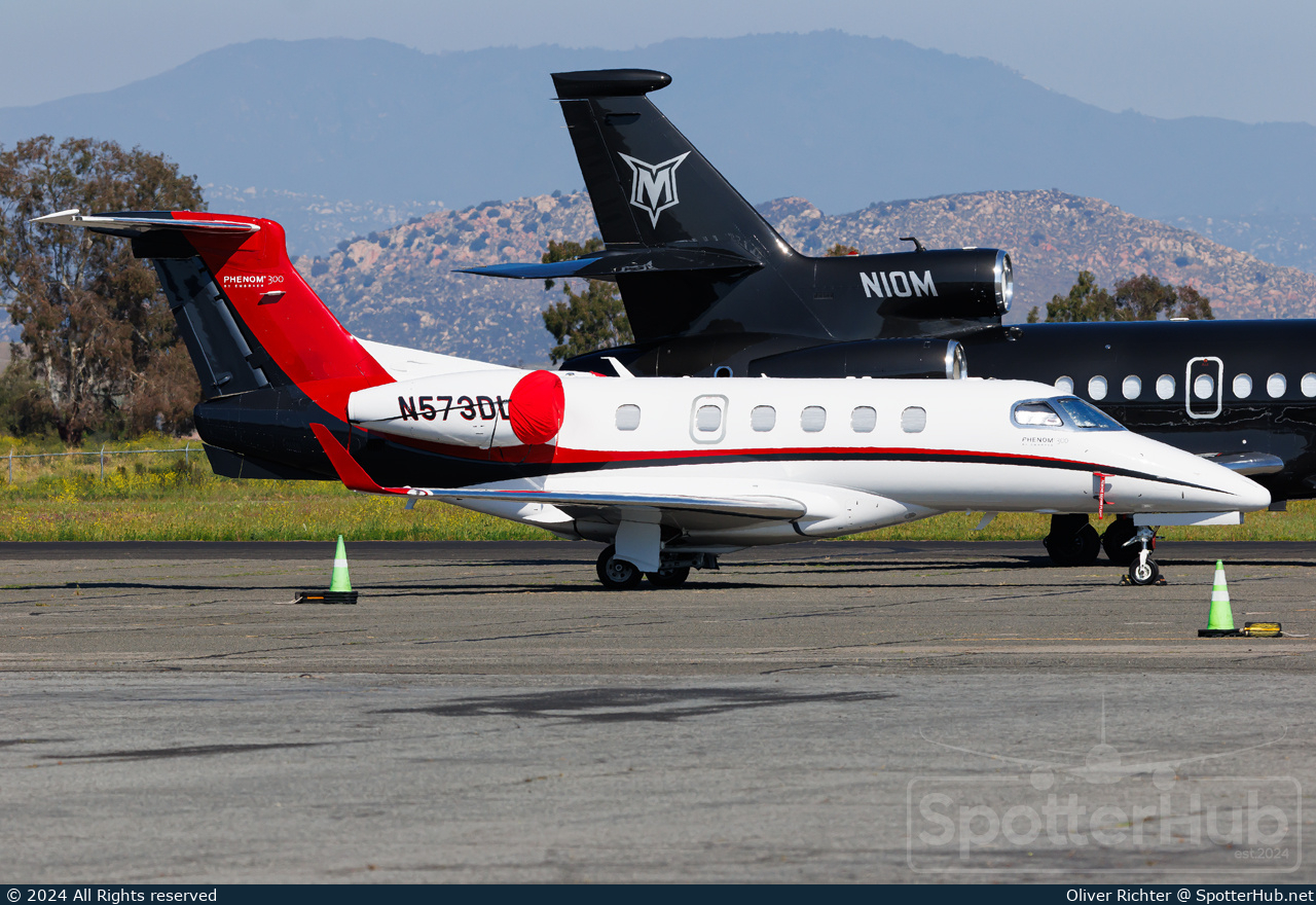 Photo of N573DL - Embraer Phenom 300 operated by Private