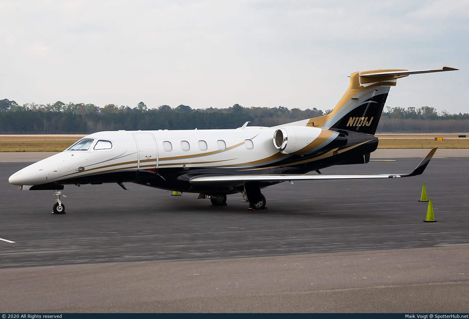 Photo of N1111J - Embraer Phenom 300 operated by Private