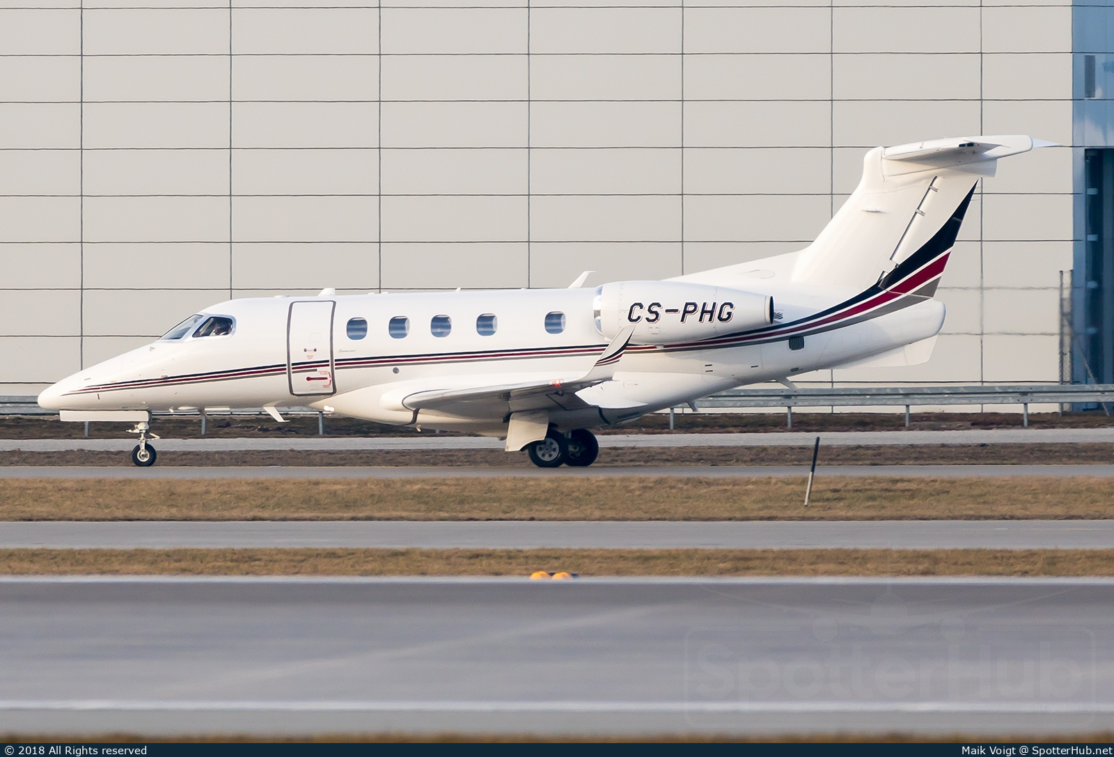 Photo of CS-PHG - Embraer Phenom 300 operated by NetJets Europe