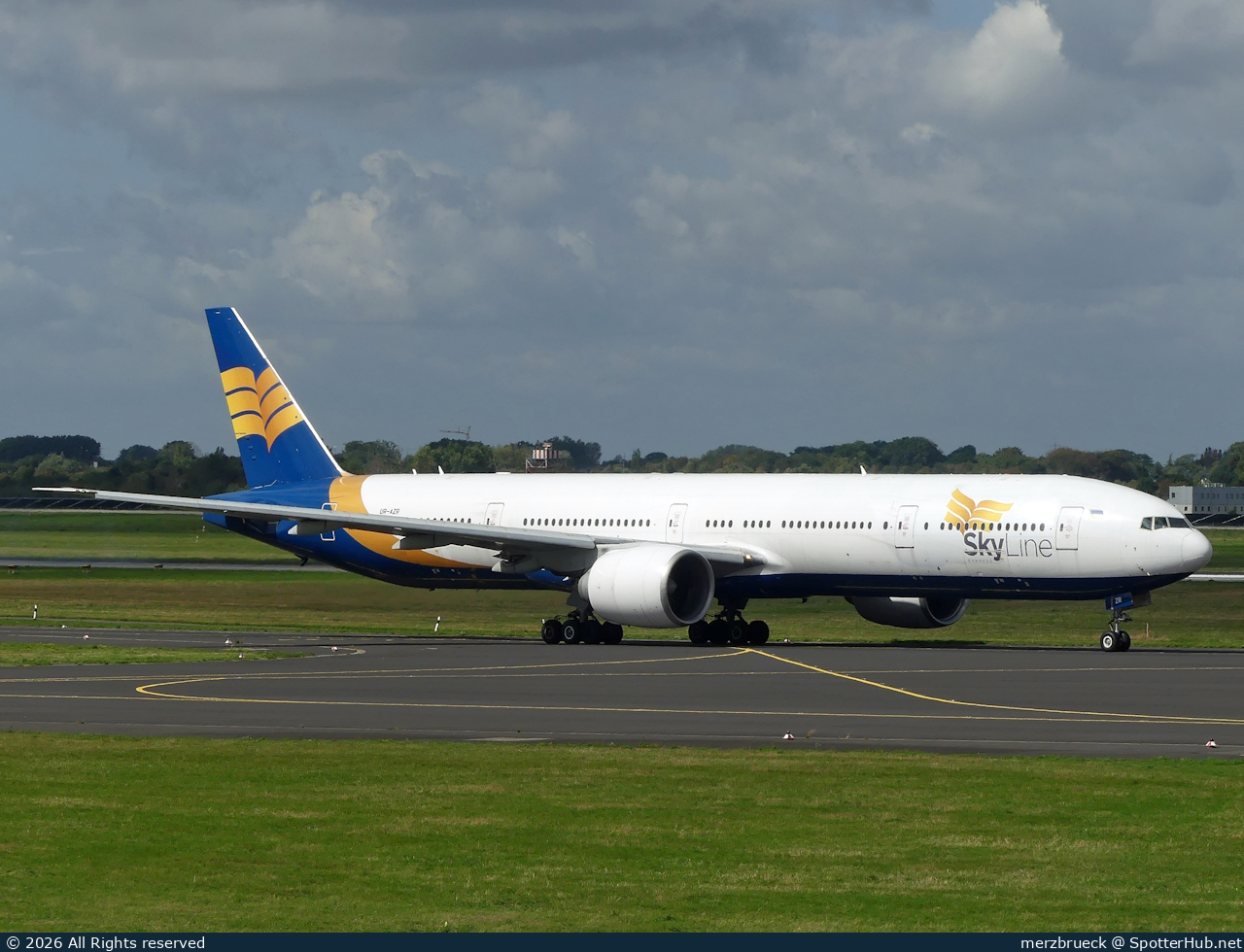 Photo of UR-AZR - Boeing 777-31H(ER) operated by Skyline Express Airlines