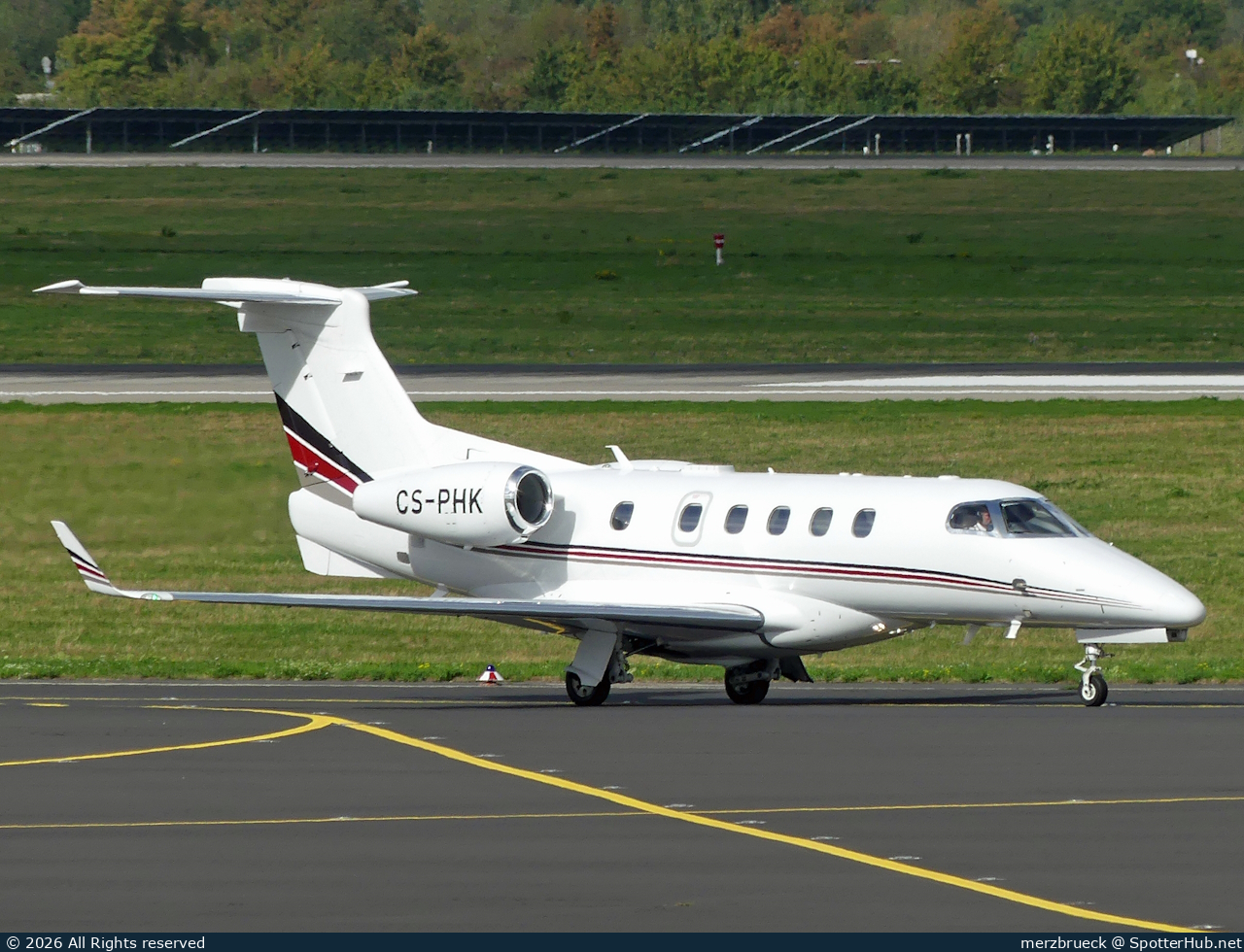 Photo of CS-PHK - Embraer Phenom 300 operated by NetJets Europe