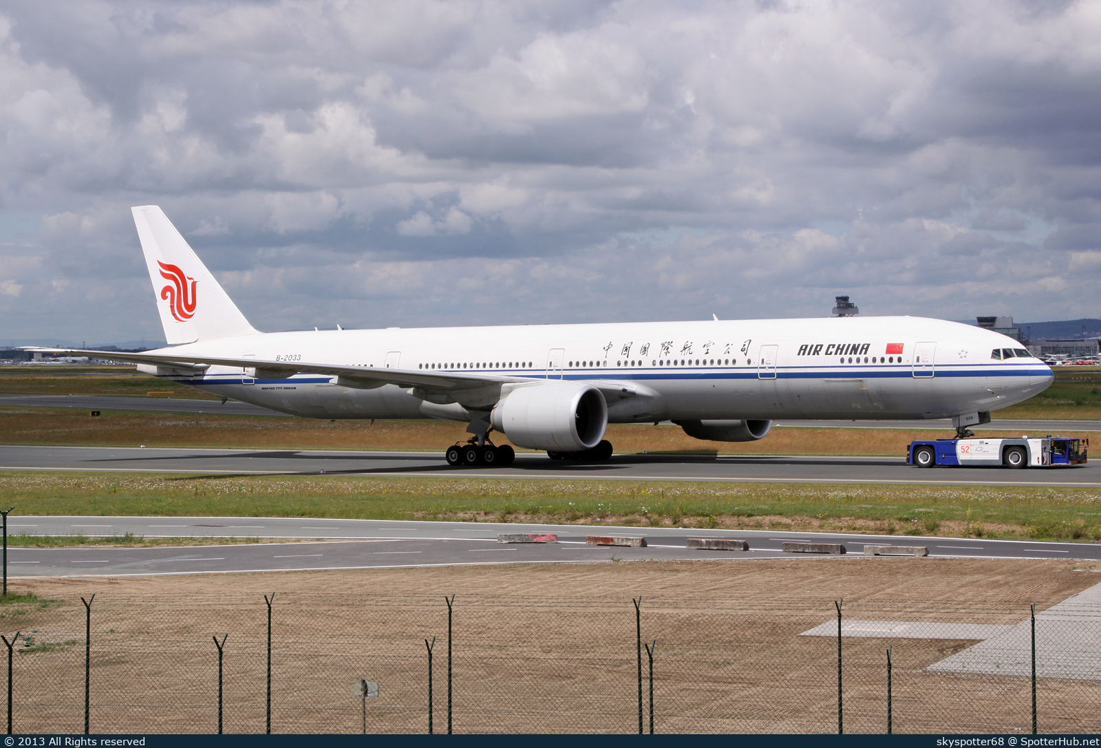 Photo of B-2033 - Boeing 777-39L(ER) operated by Air China