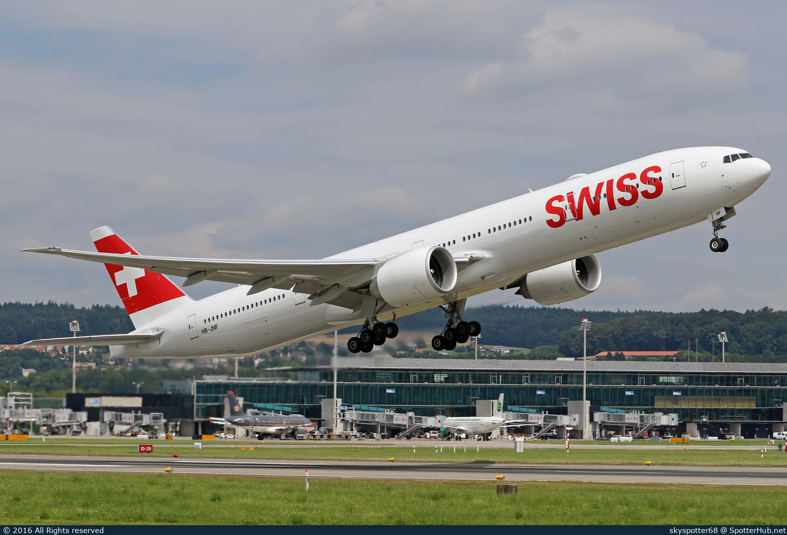 Photo of HB-JNF - Boeing 777-3DE(ER) operated by Swiss International Air Lines