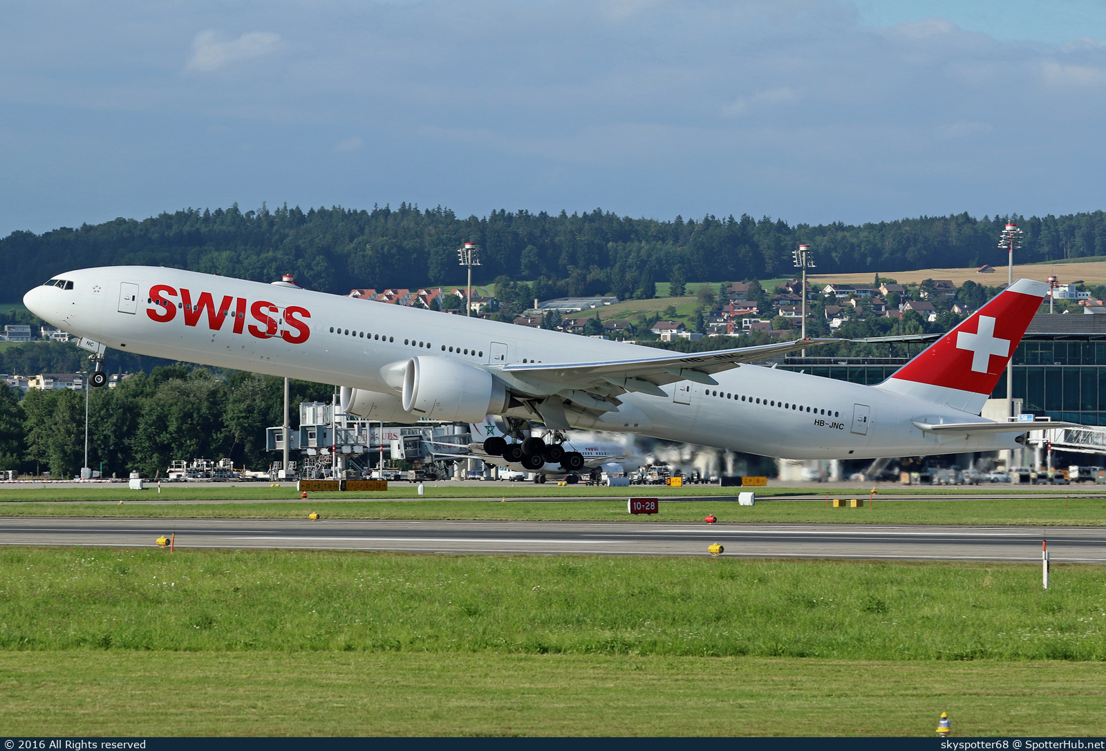 Photo of HB-JNC - Boeing 777-3DE(ER) operated by Swiss International Air Lines