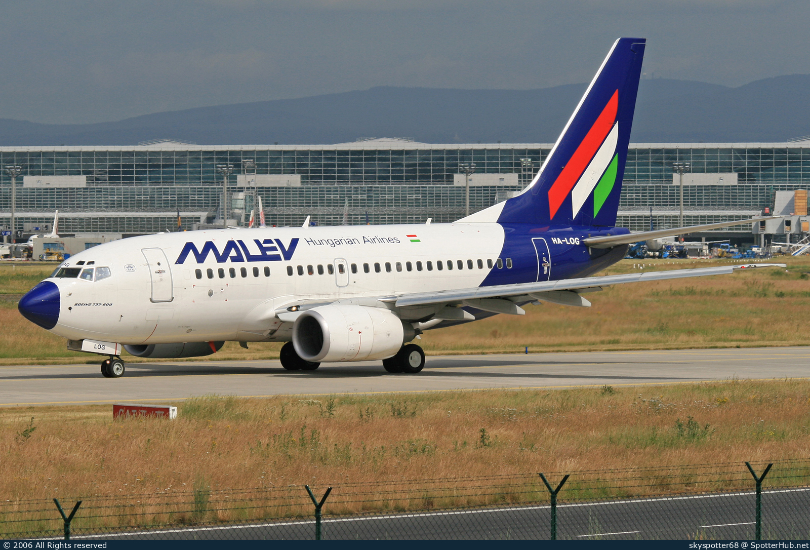 Photo of HA-LOG - Boeing 737-6Q8 operated by Malév Hungarian Airlines