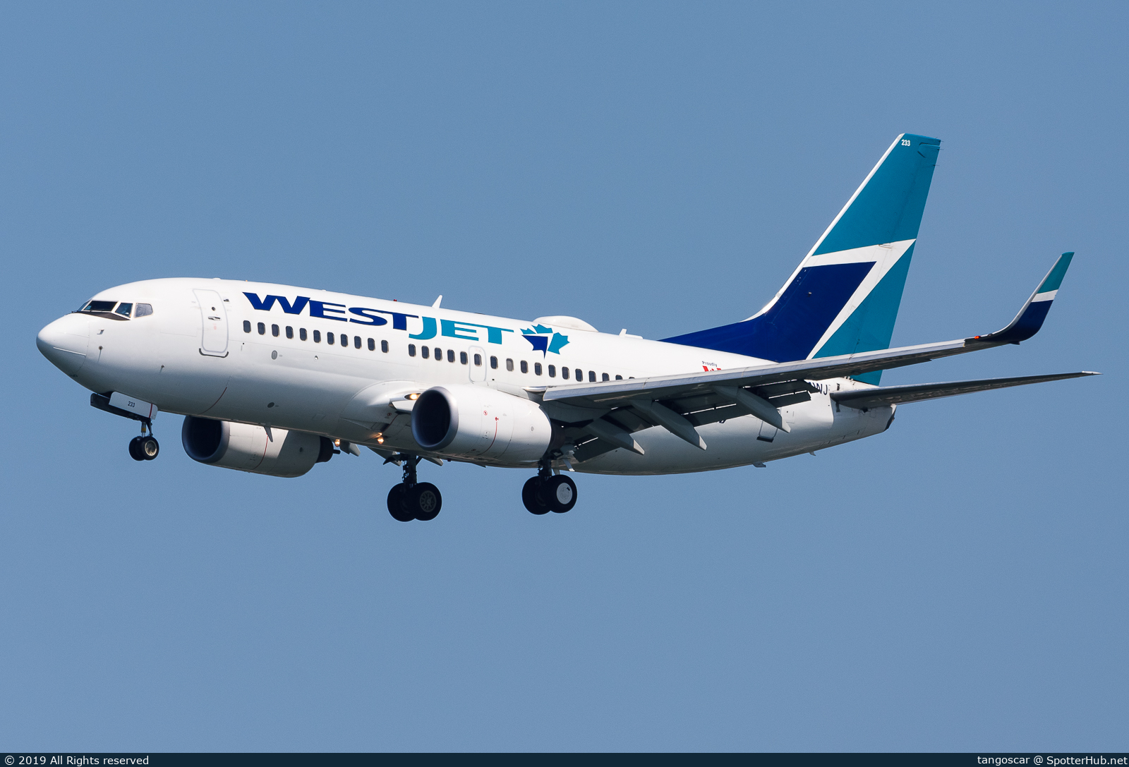 Photo of C-FMWJ - Boeing 737-7CT operated by WestJet Airlines