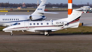 Photo of CS-PJA - Embraer Phenom 300 operated by NetJets Europe