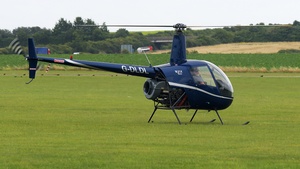 Photo of G-DLDL - Robinson R22 Beta operated by Private