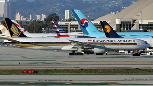 Photo of 9V-SWB - Boeing 777-312(ER) operated by Singapore Airlines